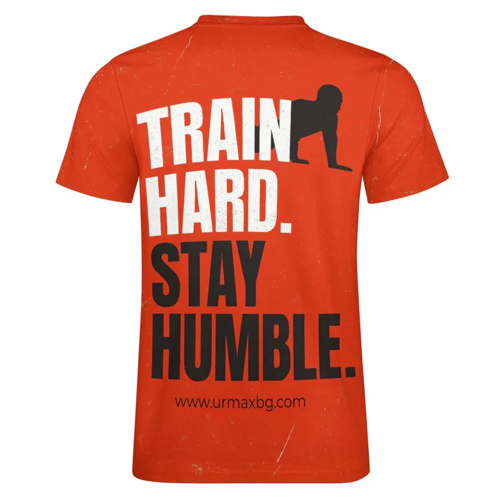 TRAINIERE HART. BLEIB BESCHEIDEN. – Motivations-T-Shirt für Herren (Feuerorange)