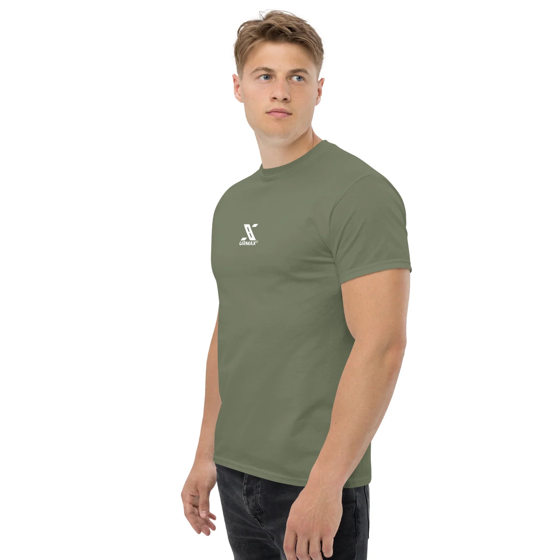 Man wearing an olive green Urmax unisex classic tee with white logo, side view